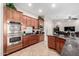 Modern kitchen with double ovens and ample cabinet space at 3332 E Powell Pl, Chandler, AZ 85249