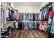 Large walk-in closet with ample shelving and rod space at 3332 E Powell Pl, Chandler, AZ 85249