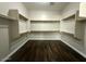 Spacious walk-in closet featuring built-in shelving at 3332 E Powell Pl, Chandler, AZ 85249