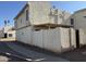 Apartment complex showing stucco walls, covered parking and walkway at 3840 N 43Rd Ave # 75, Phoenix, AZ 85031