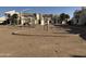 A view of a simple playground area with swings and a slide in the apartment complex at 3840 N 43Rd Ave # 75, Phoenix, AZ 85031