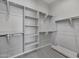 Large walk-in closet with shelves and hanging rods at 4275 E Bernice E St, Gilbert, AZ 85295