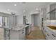 Open concept kitchen with large island and granite countertops at 4275 E Bernice E St, Gilbert, AZ 85295