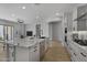 Open concept kitchen boasts an island, stainless steel appliances, and granite counters at 4275 E Bernice E St, Gilbert, AZ 85295