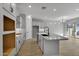 Modern kitchen with large island and white shaker cabinets at 4275 E Bernice E St, Gilbert, AZ 85295