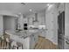 Modern kitchen features a large island with seating and stainless steel appliances at 4275 E Bernice E St, Gilbert, AZ 85295