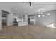 Modern kitchen with light gray cabinets, large island, and granite countertops at 4275 E Bernice E St, Gilbert, AZ 85295