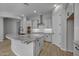 Modern kitchen with island, stainless steel appliances, and granite countertops at 4275 E Bernice E St, Gilbert, AZ 85295