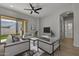 Living room with sliding glass doors, neutral decor, and staged furniture at 4275 E Bernice E St, Gilbert, AZ 85295