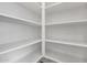 Bright white corner pantry with ample shelving at 4275 E Bernice E St, Gilbert, AZ 85295