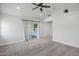 Main bedroom with vaulted ceiling, carpet, and sliding glass door to patio at 4825 E Piccadilly Rd, Phoenix, AZ 85018