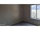 Simple bedroom with carpeted floor and window at 4841 S Vista Pl, Chandler, AZ 85248