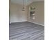 Spacious dining area with gray vinyl flooring and large windows at 4841 S Vista Pl, Chandler, AZ 85248