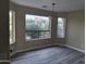 Bright dining room with lake views and vinyl flooring at 4841 S Vista Pl, Chandler, AZ 85248