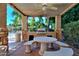 Outdoor kitchen and dining area with ceiling fan at 5450 E Mclellan Rd # 215, Mesa, AZ 85205