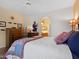 Spacious bedroom with hardwood floors, dresser, and ensuite bathroom access at 5450 E Mclellan Rd # 215, Mesa, AZ 85205
