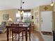 Bright dining area with bay windows and hardwood floors at 5450 E Mclellan Rd # 215, Mesa, AZ 85205