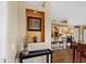 Bright entryway with built-in shelving and view of kitchen at 5450 E Mclellan Rd # 215, Mesa, AZ 85205