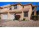 Two-story condo with attached garage and landscaping at 5450 E Mclellan Rd # 215, Mesa, AZ 85205