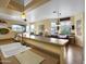 Kitchen island with sink and view of living room at 5450 E Mclellan Rd # 215, Mesa, AZ 85205