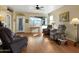 Bright living room with hardwood floors, comfortable seating, and large windows at 5450 E Mclellan Rd # 215, Mesa, AZ 85205