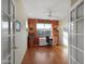 Home office with hardwood floors and built-in shelving at 5450 E Mclellan Rd # 215, Mesa, AZ 85205