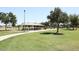Park with covered picnic tables and playground at 5450 E Mclellan Rd # 215, Mesa, AZ 85205