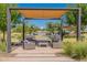 Relaxing community patio with shaded seating areas at 6134 S Antonio --, Mesa, AZ 85212