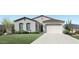 Single-story home with tile roof, two-car garage, and landscaped front yard at 6134 S Antonio --, Mesa, AZ 85212