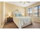 Guest bedroom with neutral decor and ample closet space at 6605 N 93Rd Ave # 1087, Glendale, AZ 85305