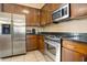 Kitchen with stainless steel appliances and ample cabinet space at 6605 N 93Rd Ave # 1087, Glendale, AZ 85305