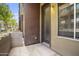 Private patio with a door leading to the outside at 6605 N 93Rd Ave # 1087, Glendale, AZ 85305