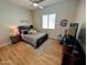 Comfortable bedroom featuring ceiling fan and natural light at 6616 W Side Canyon Trl, Phoenix, AZ 85083