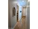 Inviting hallway leading to office and front entrance at 6616 W Side Canyon Trl, Phoenix, AZ 85083