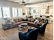 Inviting living room with an open layout, hardwood floors, and plenty of natural light at 6616 W Side Canyon Trl, Phoenix, AZ 85083