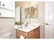 Clean bathroom with a vanity and medicine cabinet at 6657 E Regina St, Mesa, AZ 85215