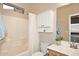 Bathroom with a shower/tub combo and vanity at 6657 E Regina St, Mesa, AZ 85215