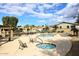 Community pool and spa with lounge chairs at 6657 E Regina St, Mesa, AZ 85215