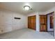 Bedroom with closet and door to hallway at 7833 S Terrace Rd, Tempe, AZ 85284