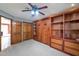 Bedroom with wooden closet and built-in shelves at 7833 S Terrace Rd, Tempe, AZ 85284