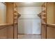 Walk-in closet with ample shelving and hanging space at 7833 S Terrace Rd, Tempe, AZ 85284