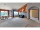 Bright dining area with large windows and a built-in display shelf at 7833 S Terrace Rd, Tempe, AZ 85284