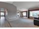 Open dining area with a view to the living room and hallway at 7833 S Terrace Rd, Tempe, AZ 85284