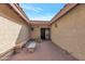 Courtyard entry with brick pavers and a stone bench at 7833 S Terrace Rd, Tempe, AZ 85284