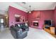 Cozy living room features a fireplace and comfy seating at 7833 S Terrace Rd, Tempe, AZ 85284