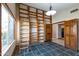 Home office with built-in shelving and ladder at 7833 S Terrace Rd, Tempe, AZ 85284