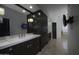 Luxurious bathroom with double vanity and large mirror at 10040 N 78Th Pl, Scottsdale, AZ 85258