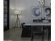 Elegant dining room with marble table and modern chandelier at 10040 N 78Th Pl, Scottsdale, AZ 85258