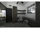 Functional home office with built-in cabinetry and desk at 10040 N 78Th Pl, Scottsdale, AZ 85258