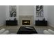 Elegant living room features a fireplace and stylish furnishings at 10040 N 78Th Pl, Scottsdale, AZ 85258